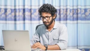 web design hurstville professional reviewing website layout on a laptop